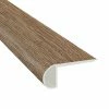 Edwards Oak-3/4 in. Thick x 2-3/4 in. Wide x 94 in. Length Luxury Vinyl Flush Stair Nose Molding by TrafficMaster 1 Edwards Oak-3/4 in. Thick x 2-3/4 in. Wide x 94 in. Length Luxury Vinyl Flush Stair Nose Molding by TrafficMaster -TrafficMaster Sales 2024 edwards oak trafficmaster vinyl trim vtthddevoak fsn 64 1000