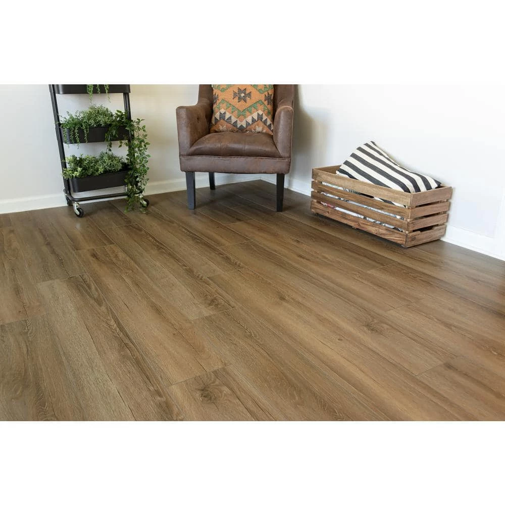 Kettle Keep Oak 8 mm T x 8.03 in. W Water Resistant Laminate Wood Flooring (21.26 sq.ft/Case) by TrafficMaster 4 Kettle Keep Oak 8 mm T x 8.03 in. W Water Resistant Laminate Wood Flooring (21.26 sq.ft/Case) by TrafficMaster - Image 2